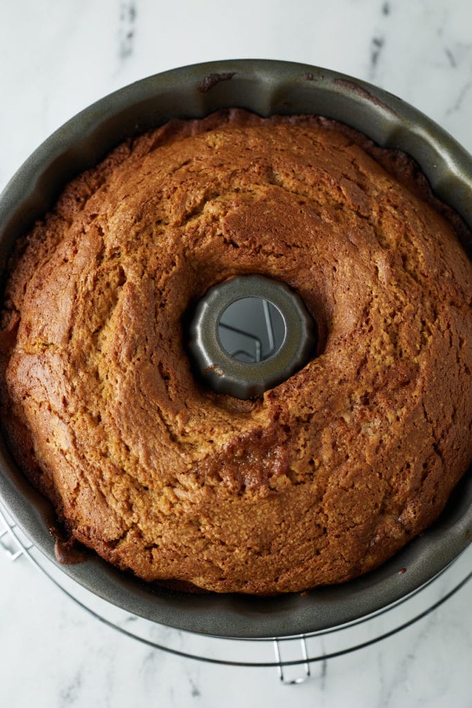 The baked cake in the bundt tin.