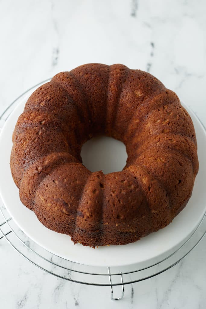 The sweet potato bundt cake turned out onto a plate.