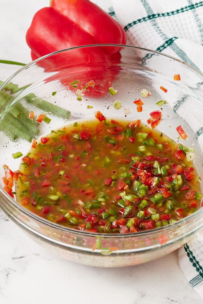 The vinaigrette in a glass bowl.