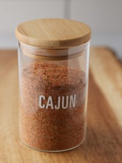 A storage jar holding the Cajun seasoning.