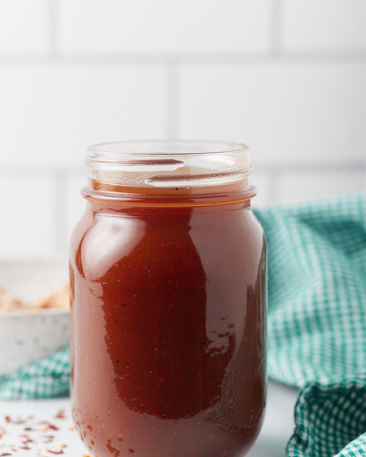 BBQ sauce in a glass jar.