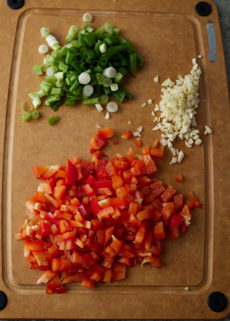 Diced vegetables on a chopping board.