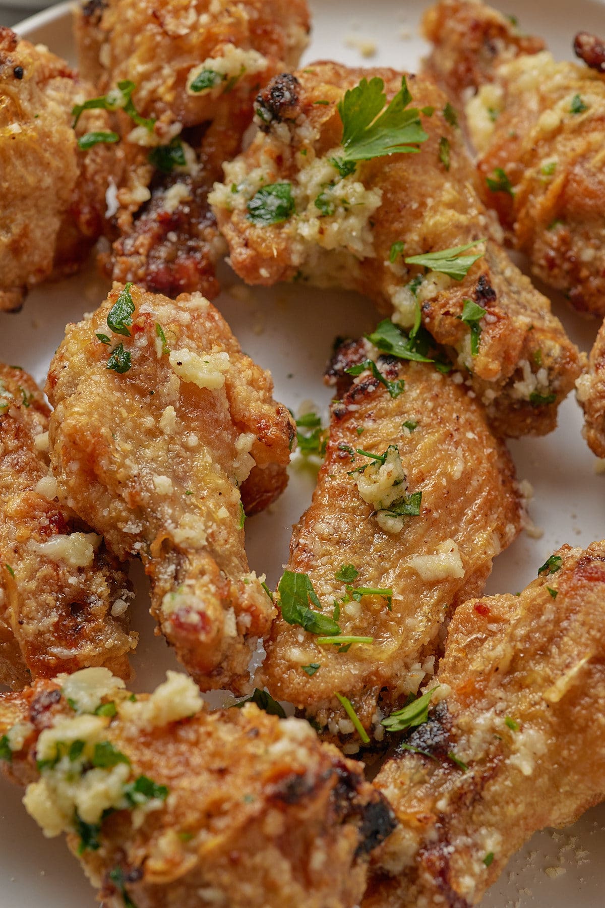 Close up of garlic parmesan chicken wings.