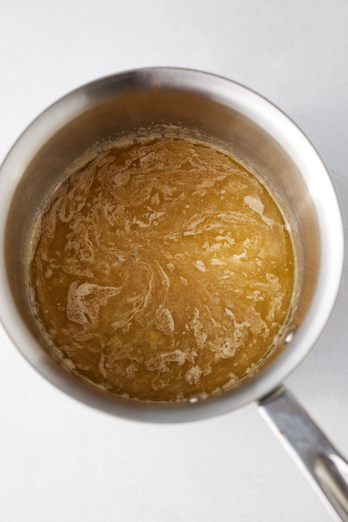 Honey garlic sauce in a pot.