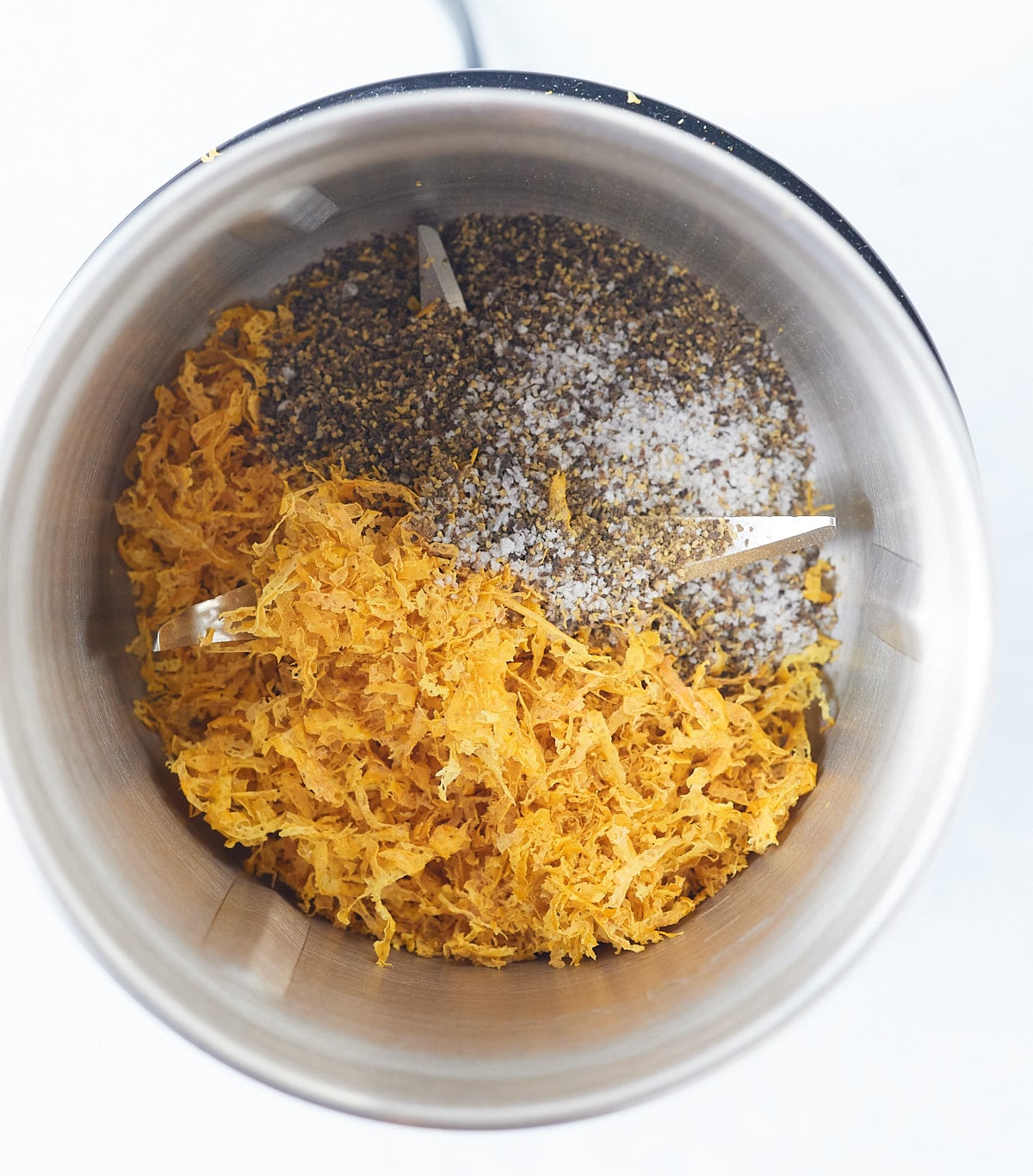 Dried lemon zest, salt and pepper in a spice grinder.