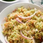 Pinterest graphic. Broccoli slaw with text overlay.