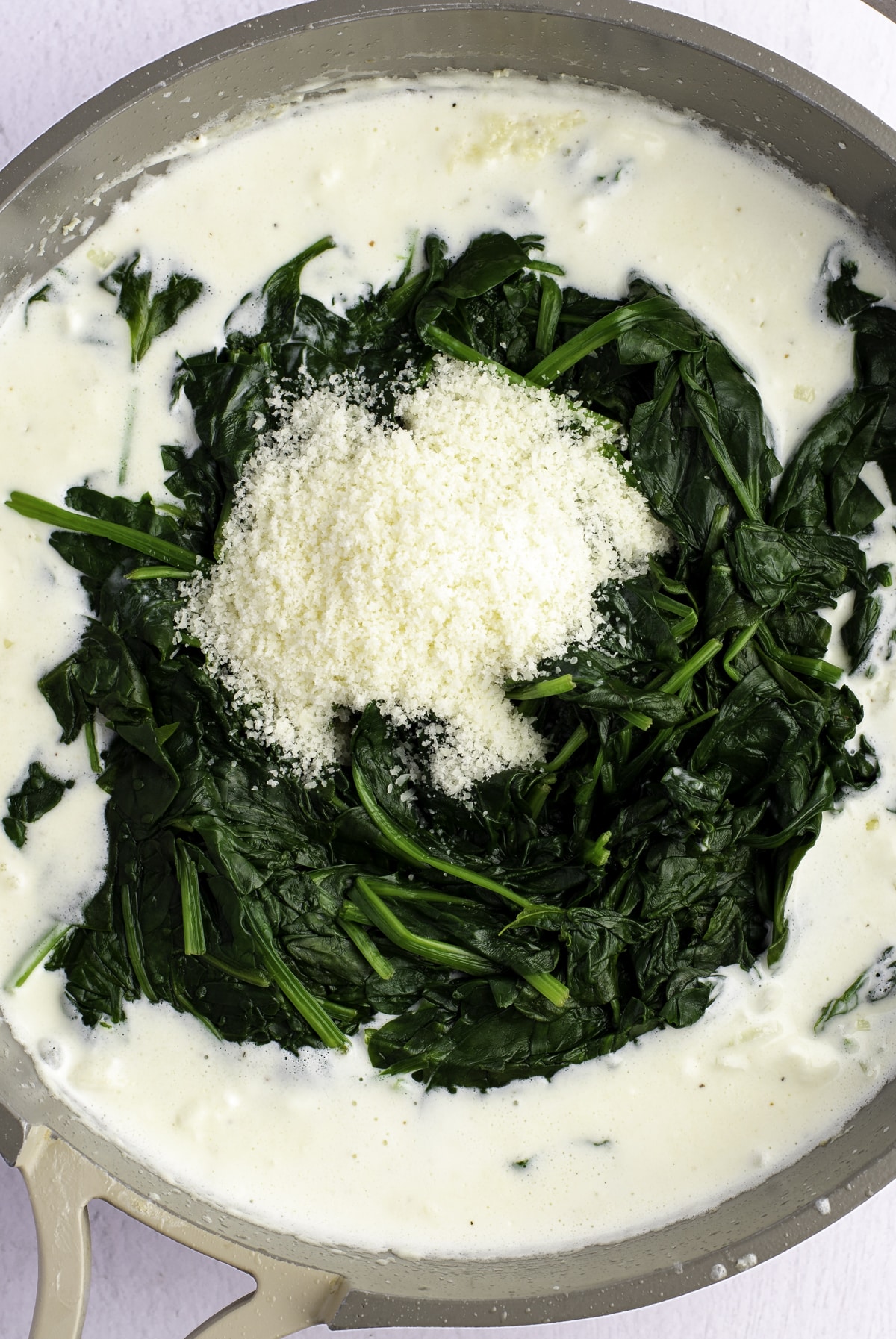 Spinach and parmesan added to the cream.