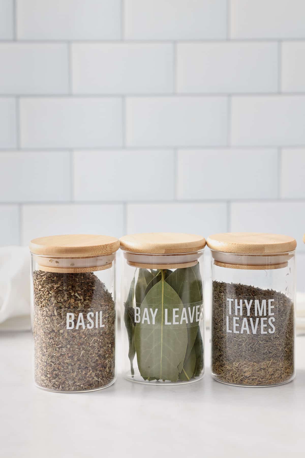 dries herbs in glass containers
