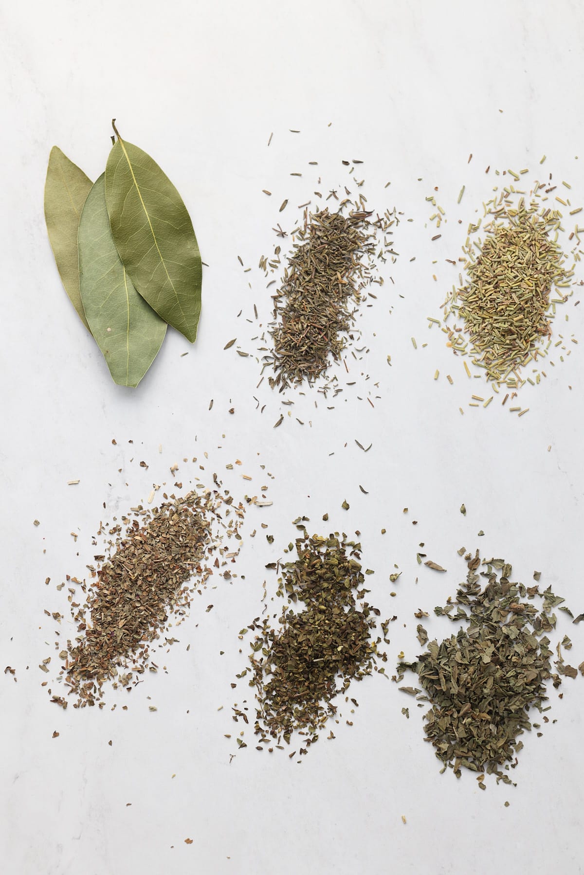 dried herbs on a white background
