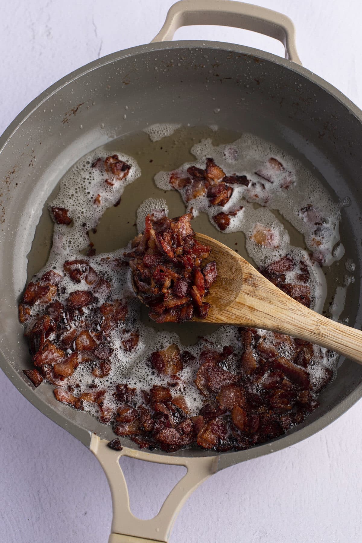 Cooking bacon bits til crispy.