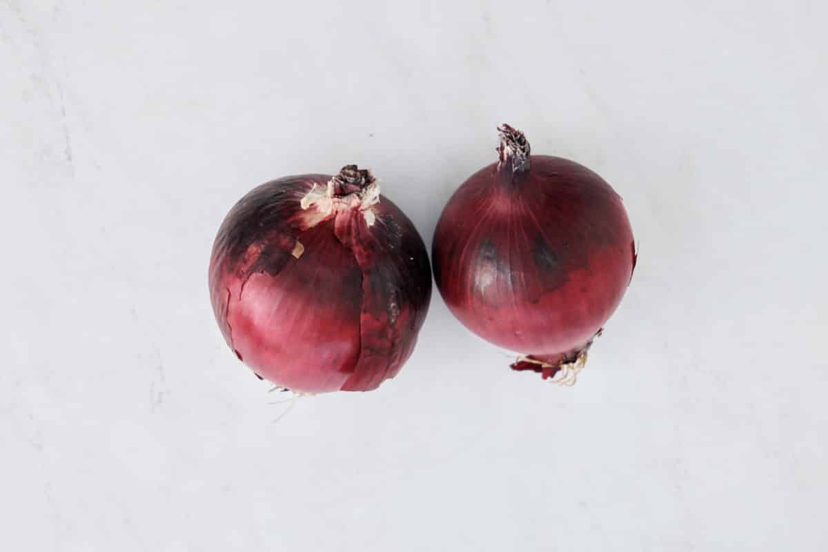 red onions on white background