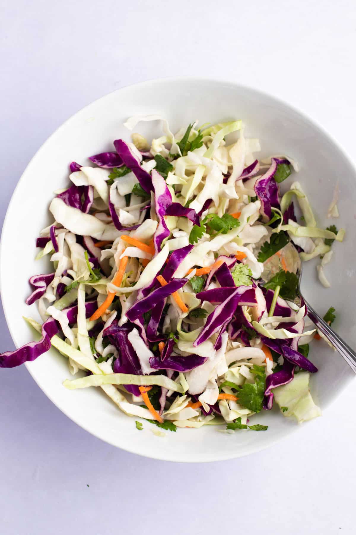 Slaw in a white bowl.