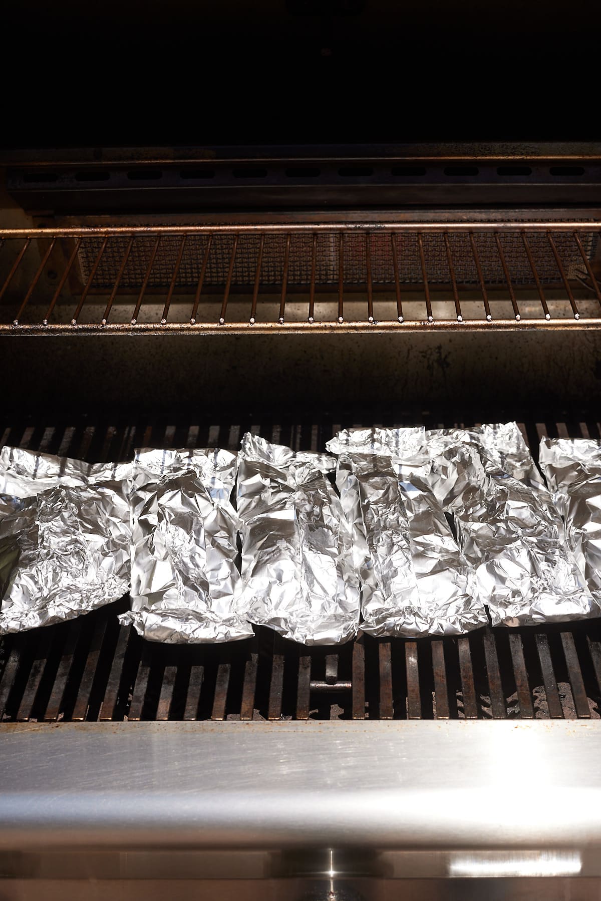 foil packets on a grill
