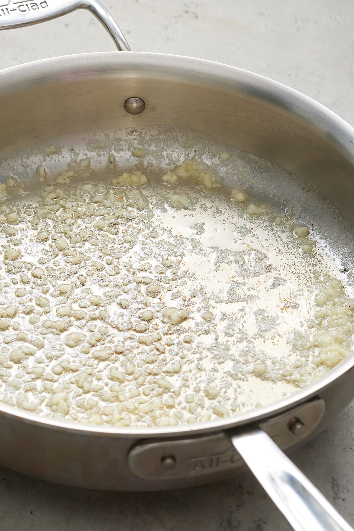 Butter and garlic in a skillet.