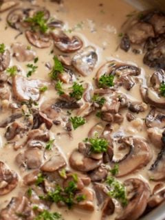 Close up of the finished mushroom sauce with fresh parsley.