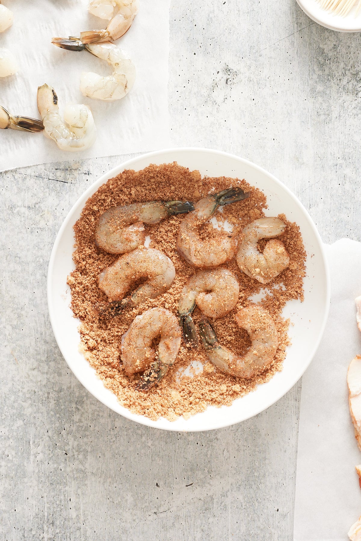 raw shrimp in brown sugar and chili powder mix