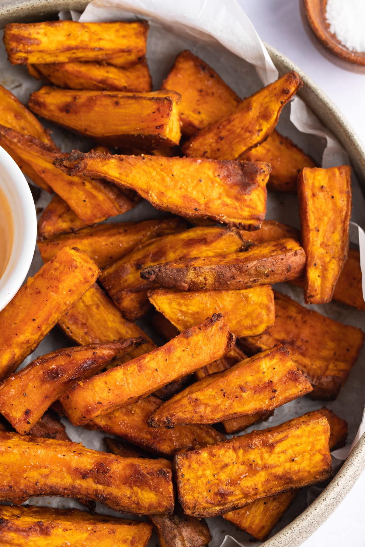 Close up of sweet potato wedge fries.