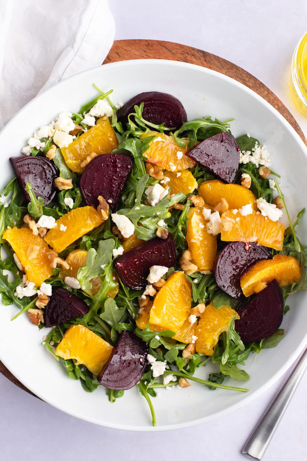 Beet and orange salad with arugula.