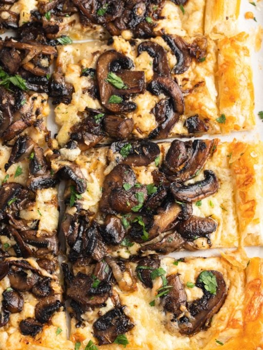 Browned mushrooms baked on puff pastry.