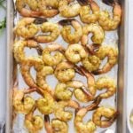 cooked shrimp on a baking sheet