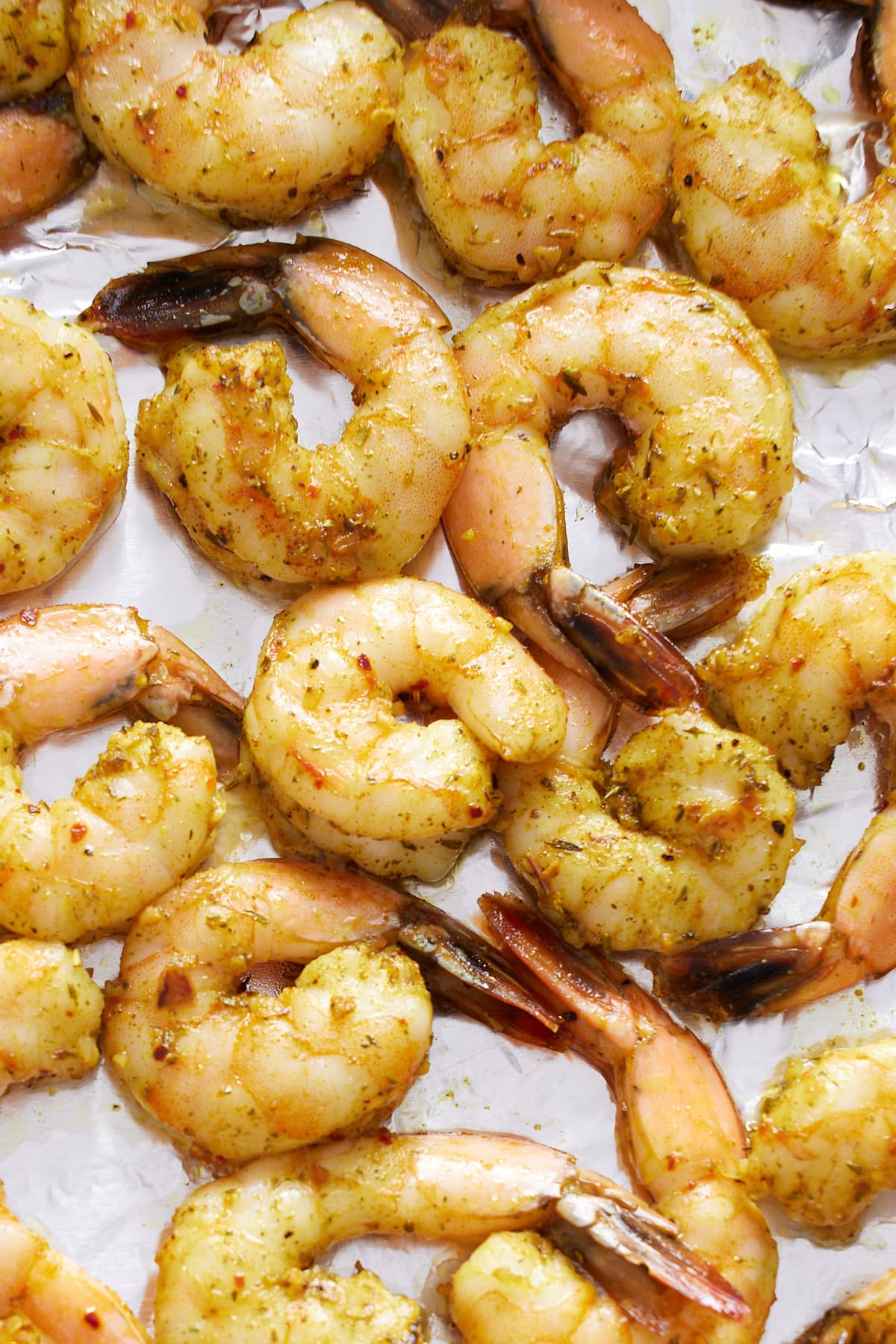 close up photo of shrimp on sheet pan