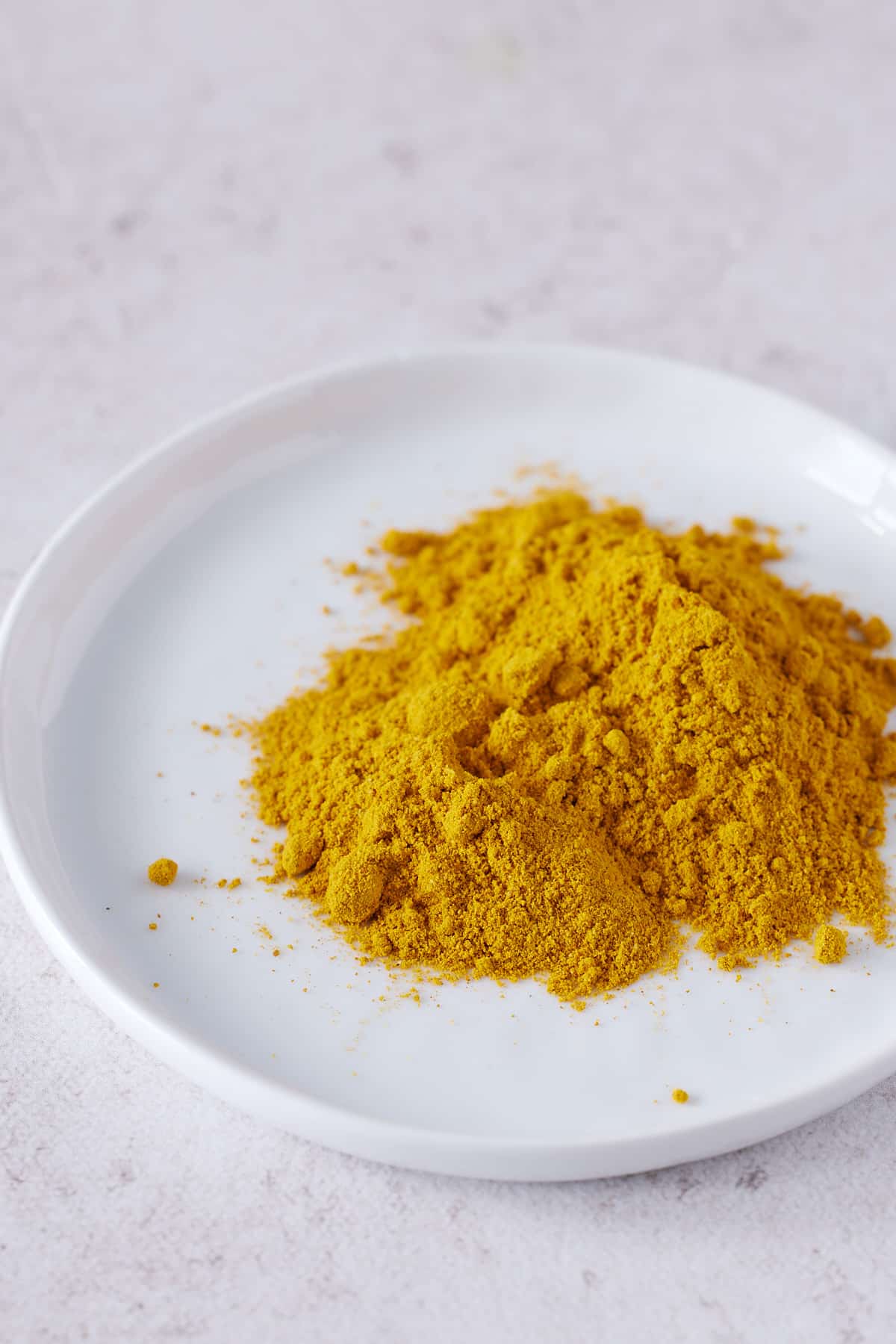 Jamaican curry powder on white plate