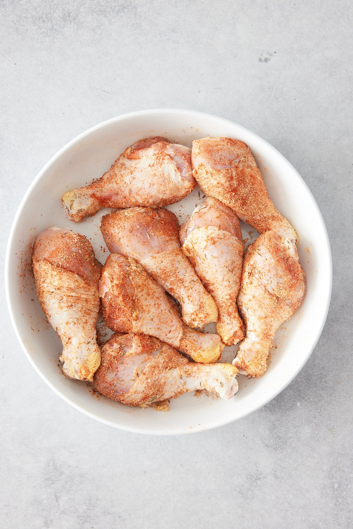 seasoned bowl of chicken drumsticks