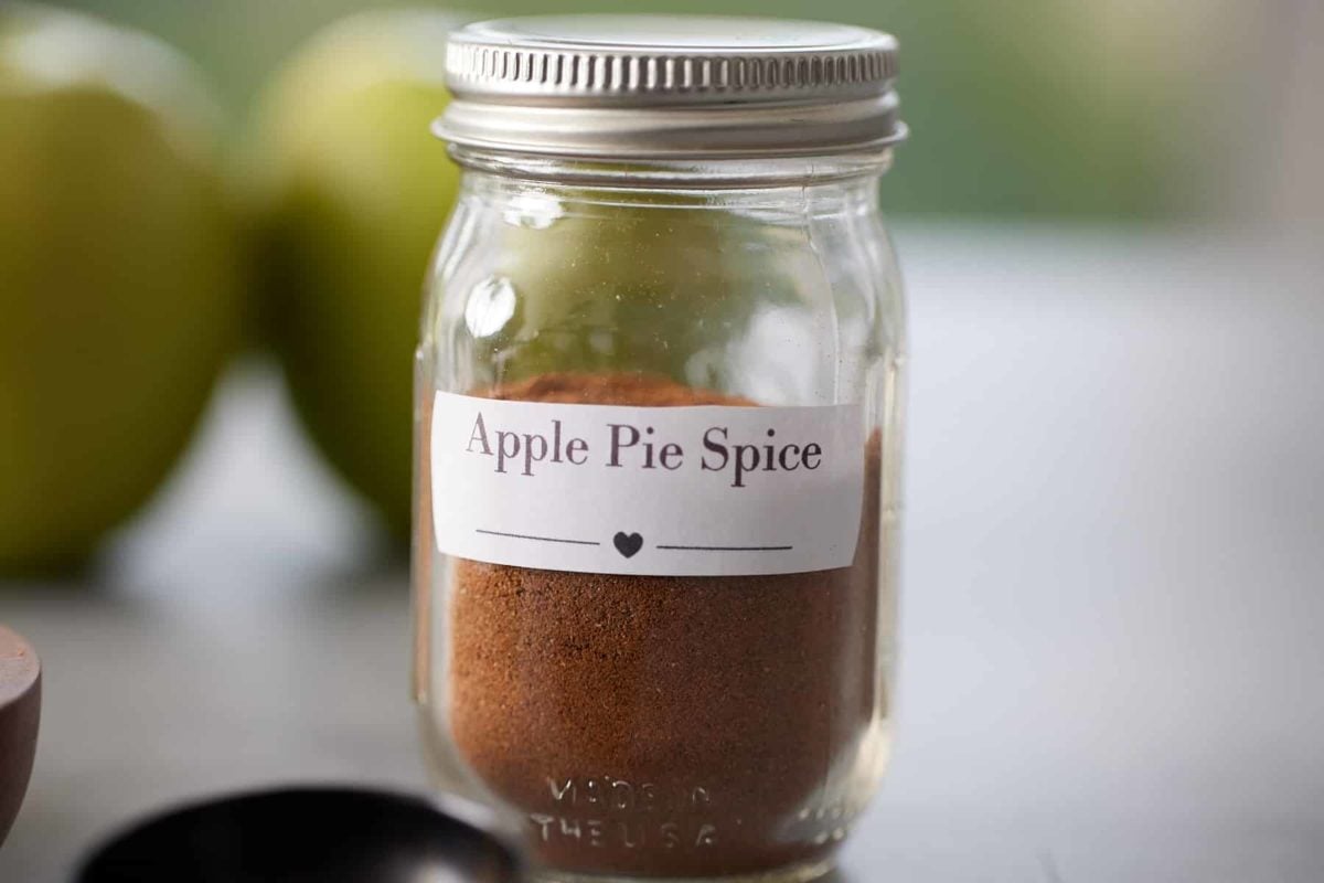 Close up of a jar of apple pie spice blend