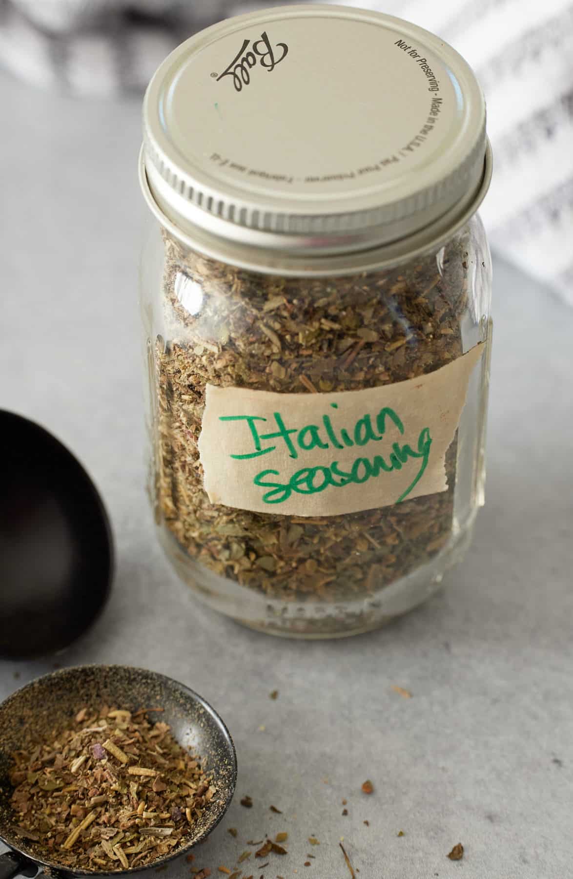 Small jar filled with italian seasoning