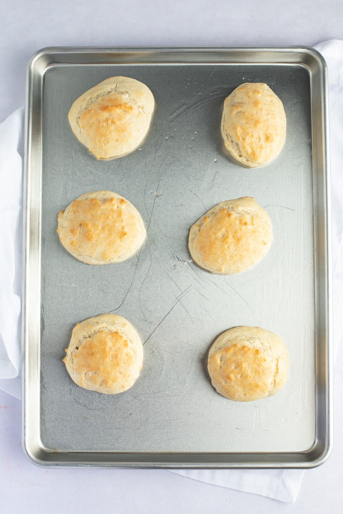 baked mayonnaise biscuits on sheetpan