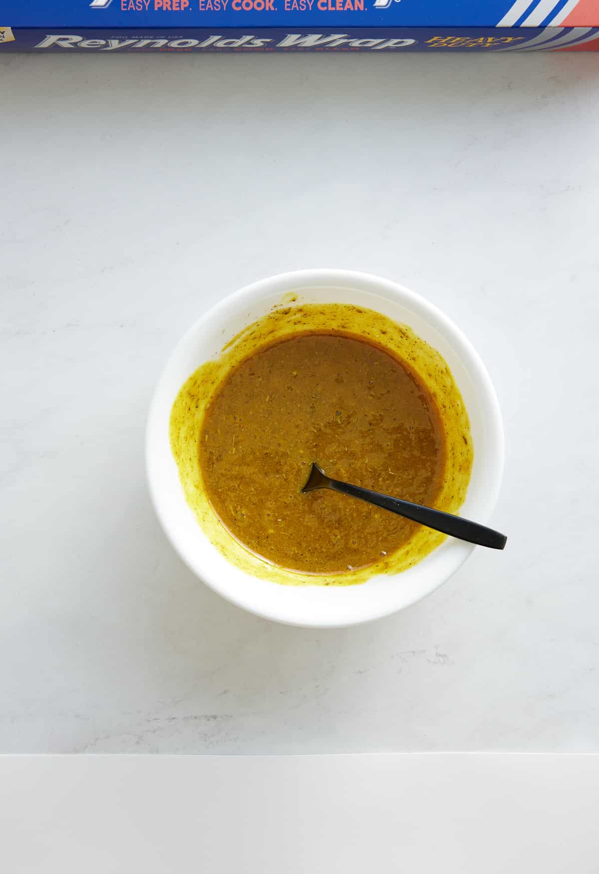 mustard glaze in white bowl