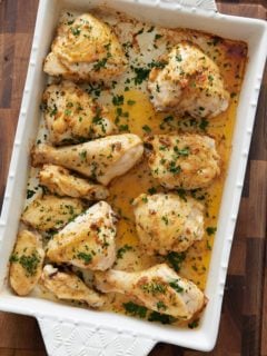 chicken pieces in a baking dish