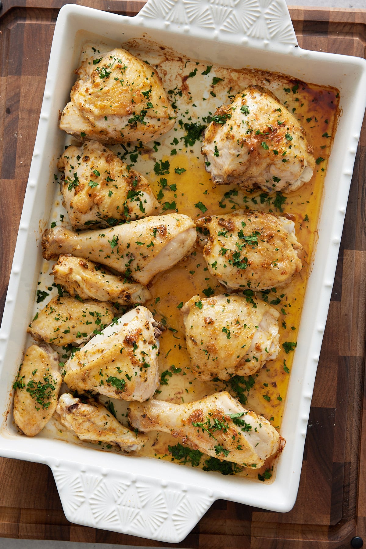 chicken pieces in a baking dish