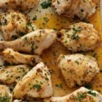 chicken pieces in a baking dish