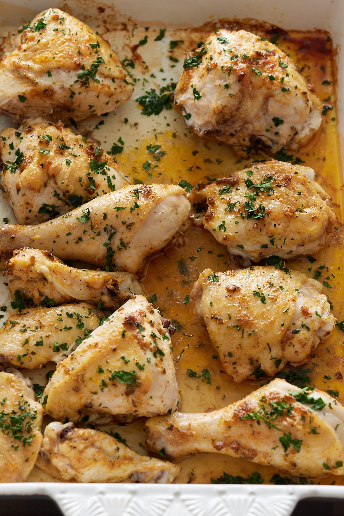 chicken pieces in a baking dish