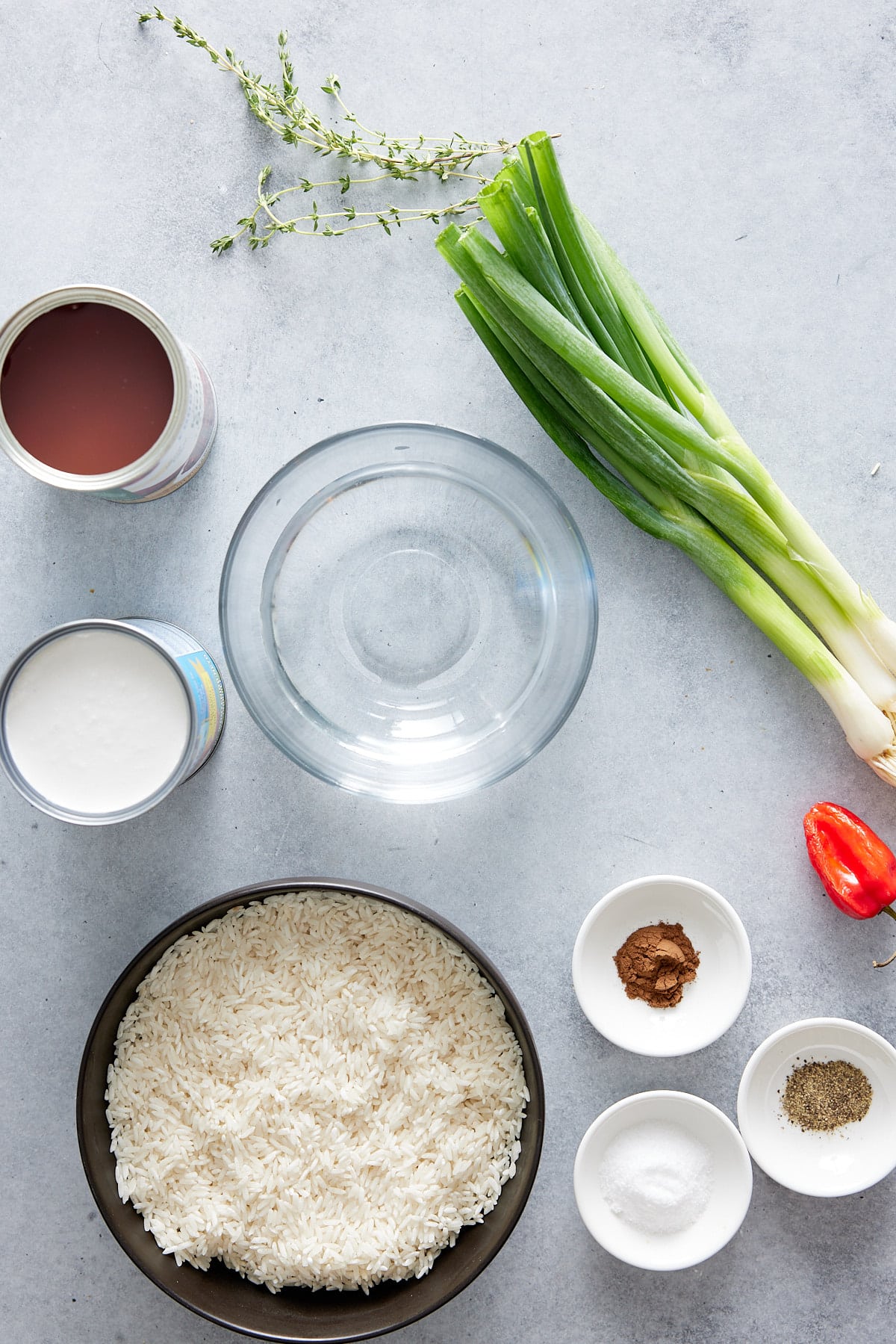 Jamaican rice and peas recipe ingredients set on marble worktop