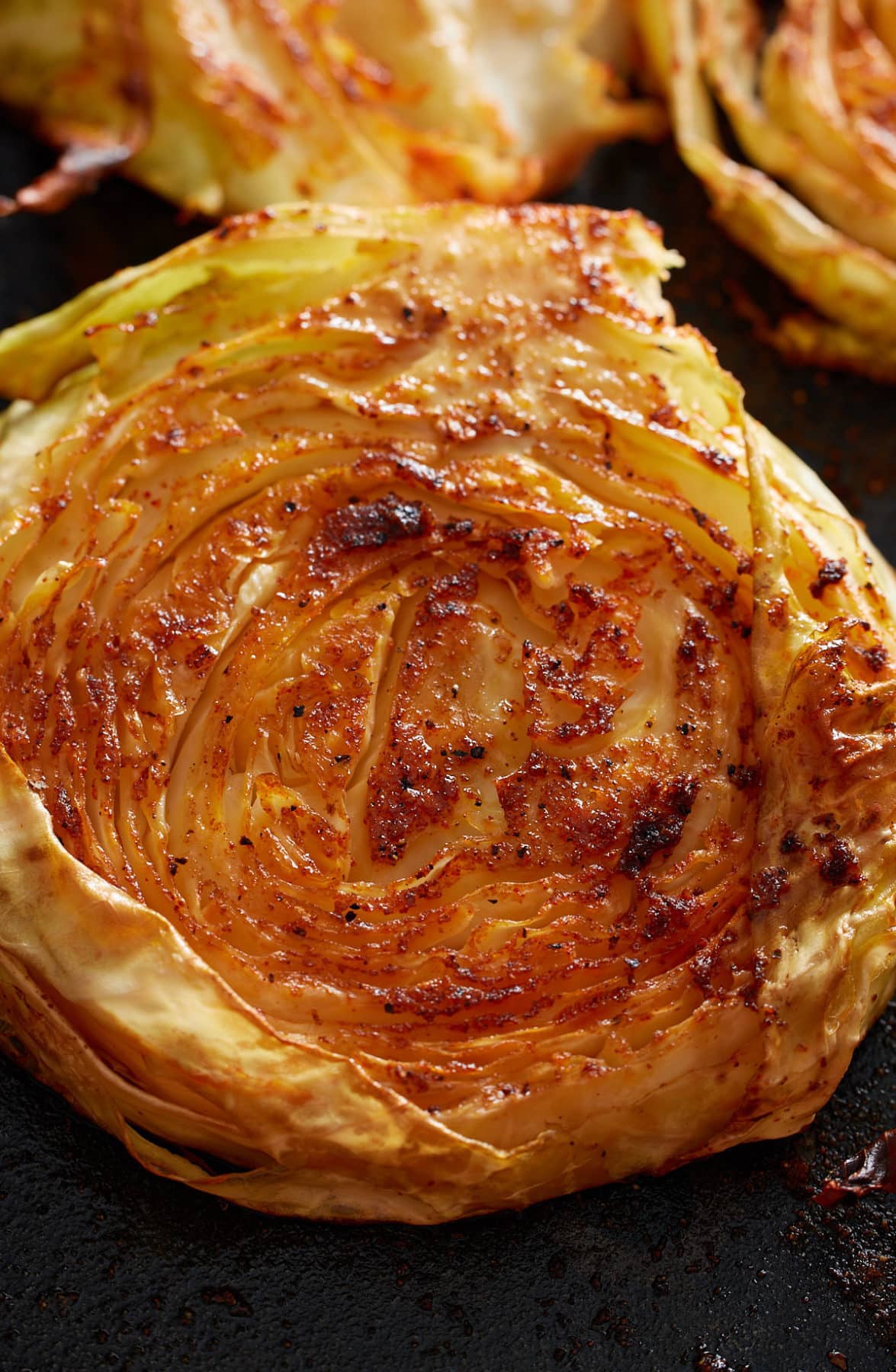 close up of a roasted cabbage steak