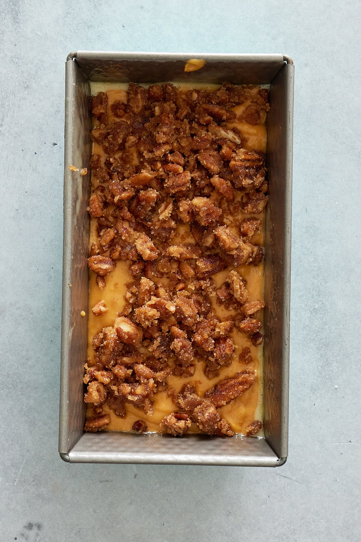 topping placed ontop of bread mixture in the bread pan