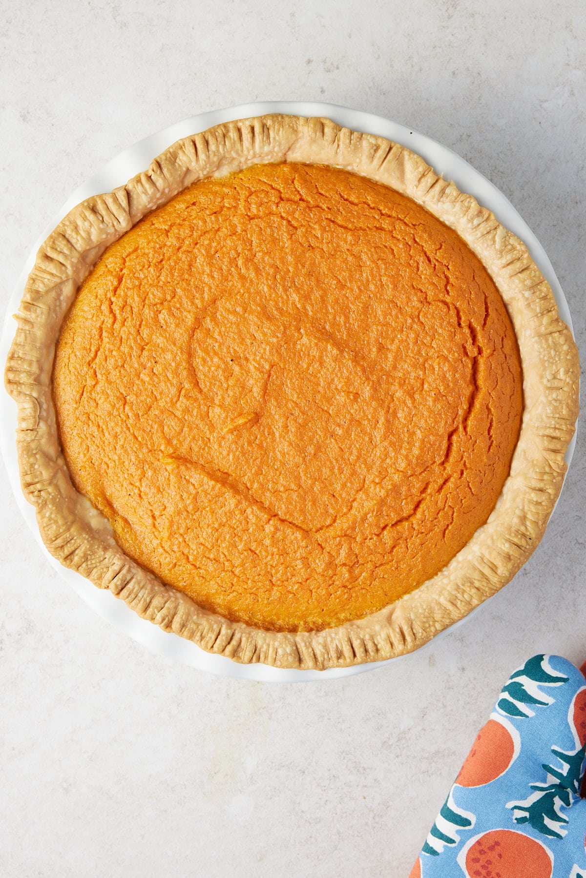 Top down image of a baked carrot pie