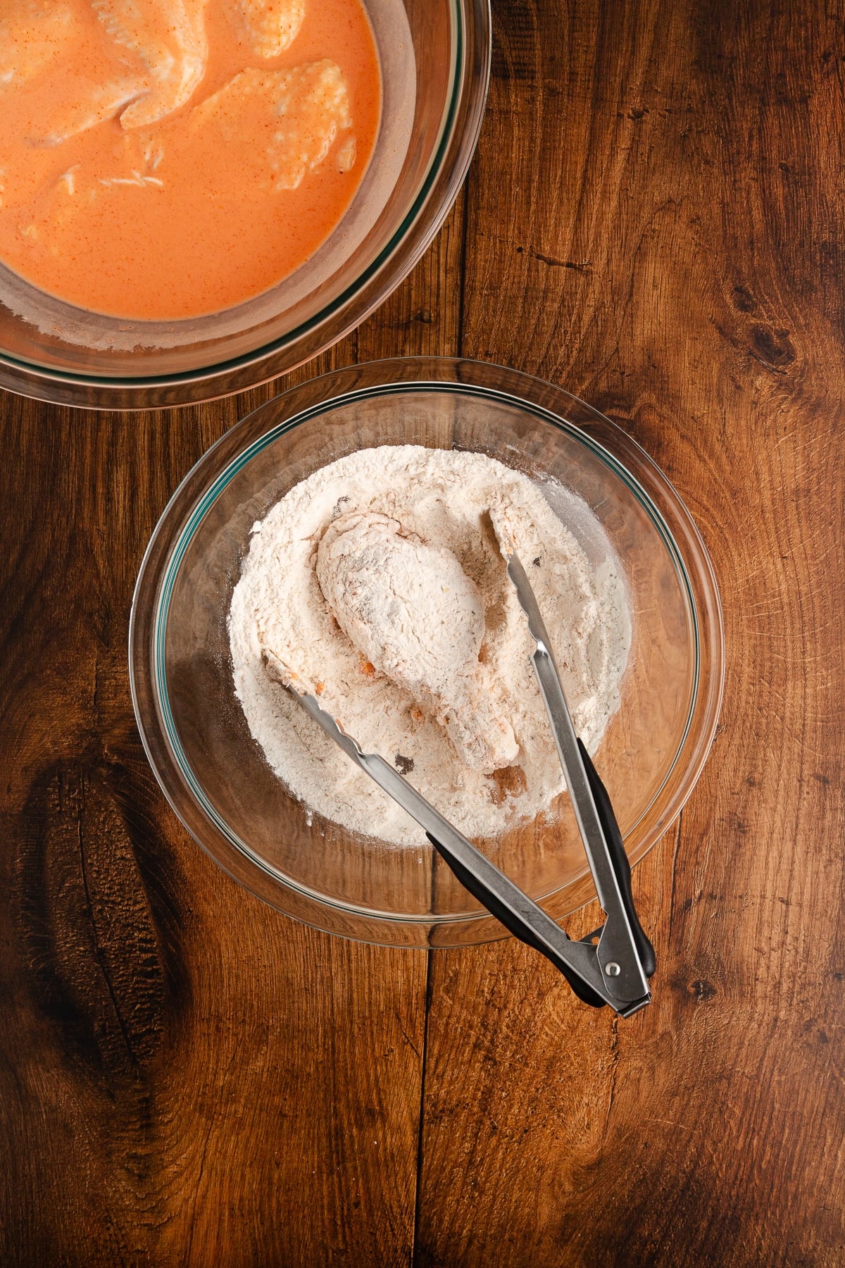 Marinated chicken in flour mixture. 