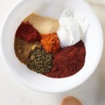 fajita spices placed in a bowl, unmixed