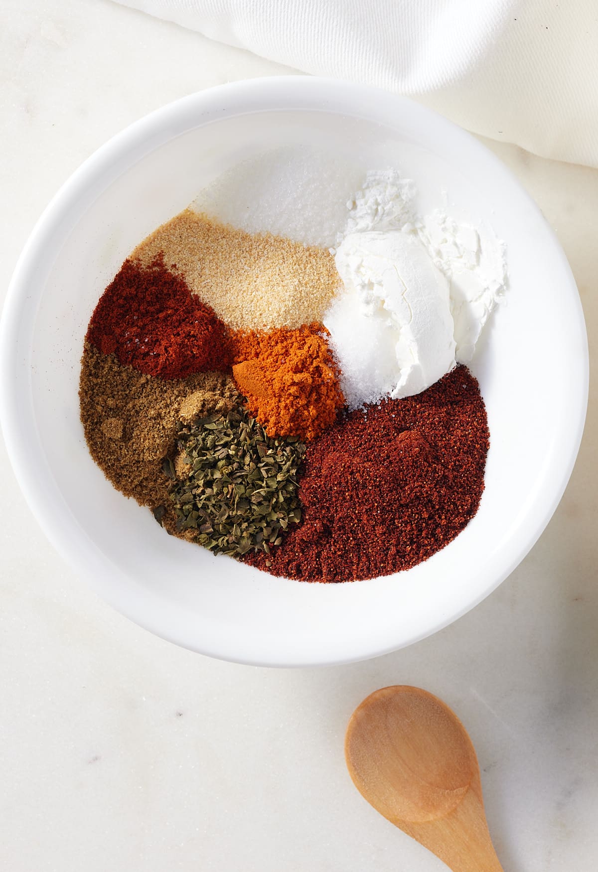 fajita spices placed in a bowl, unmixed