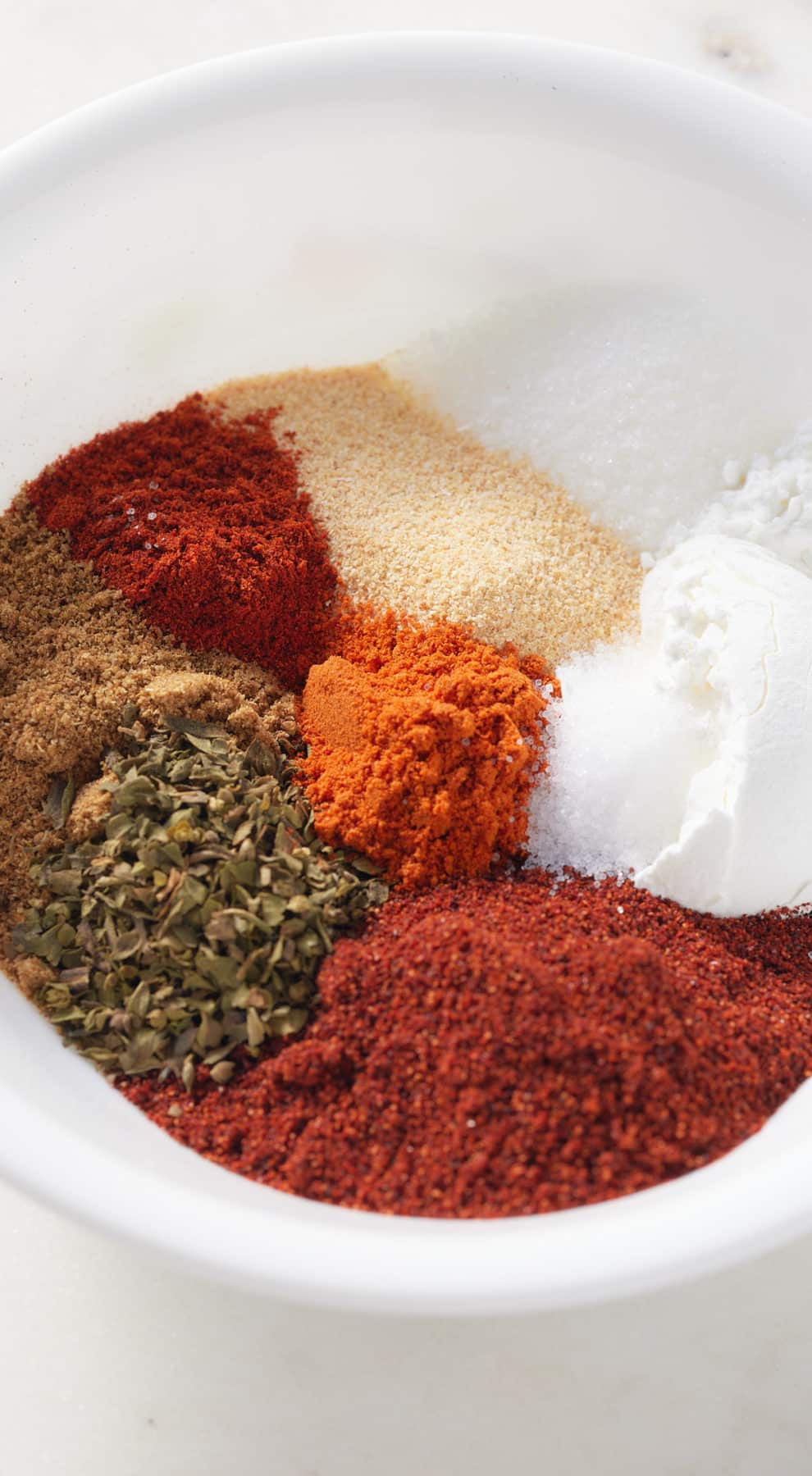 fajita spices placed in a bowl, unmixed