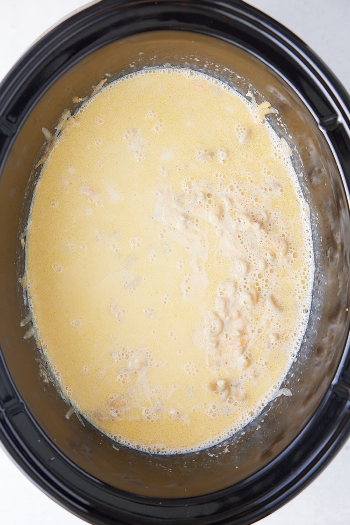 cheese sauce and noodles in slow cooker