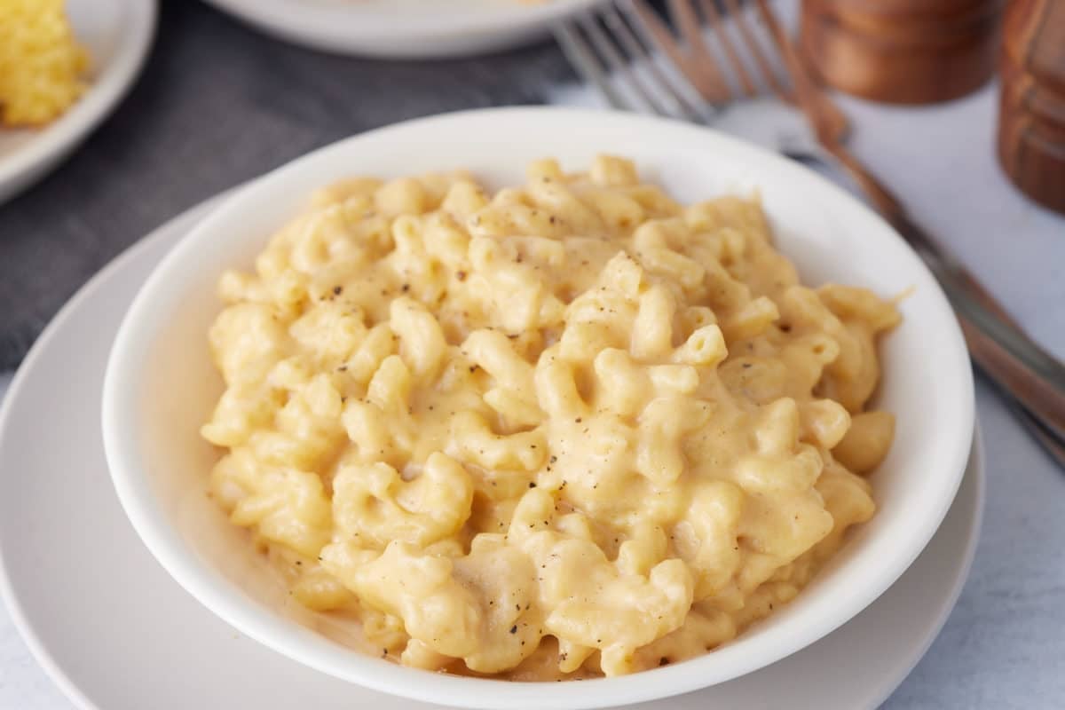 white bowl full of mac and cheese