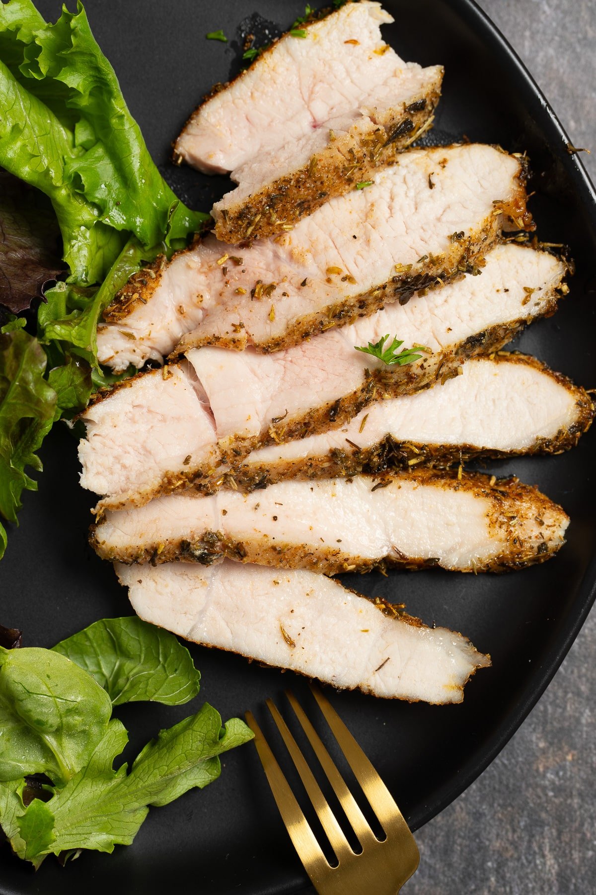 sliced pork chop on plate