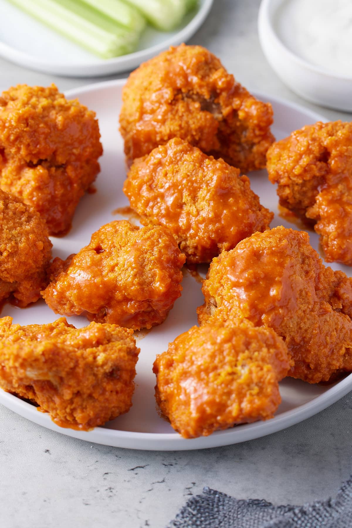 fried cauliflower wings coated in buffalo sauce