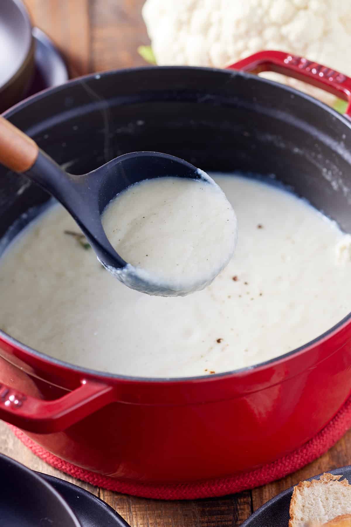 cauliflower soup being ladled out