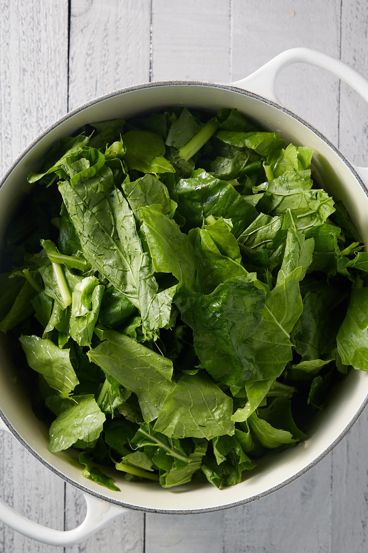 turnip greens in a strainer