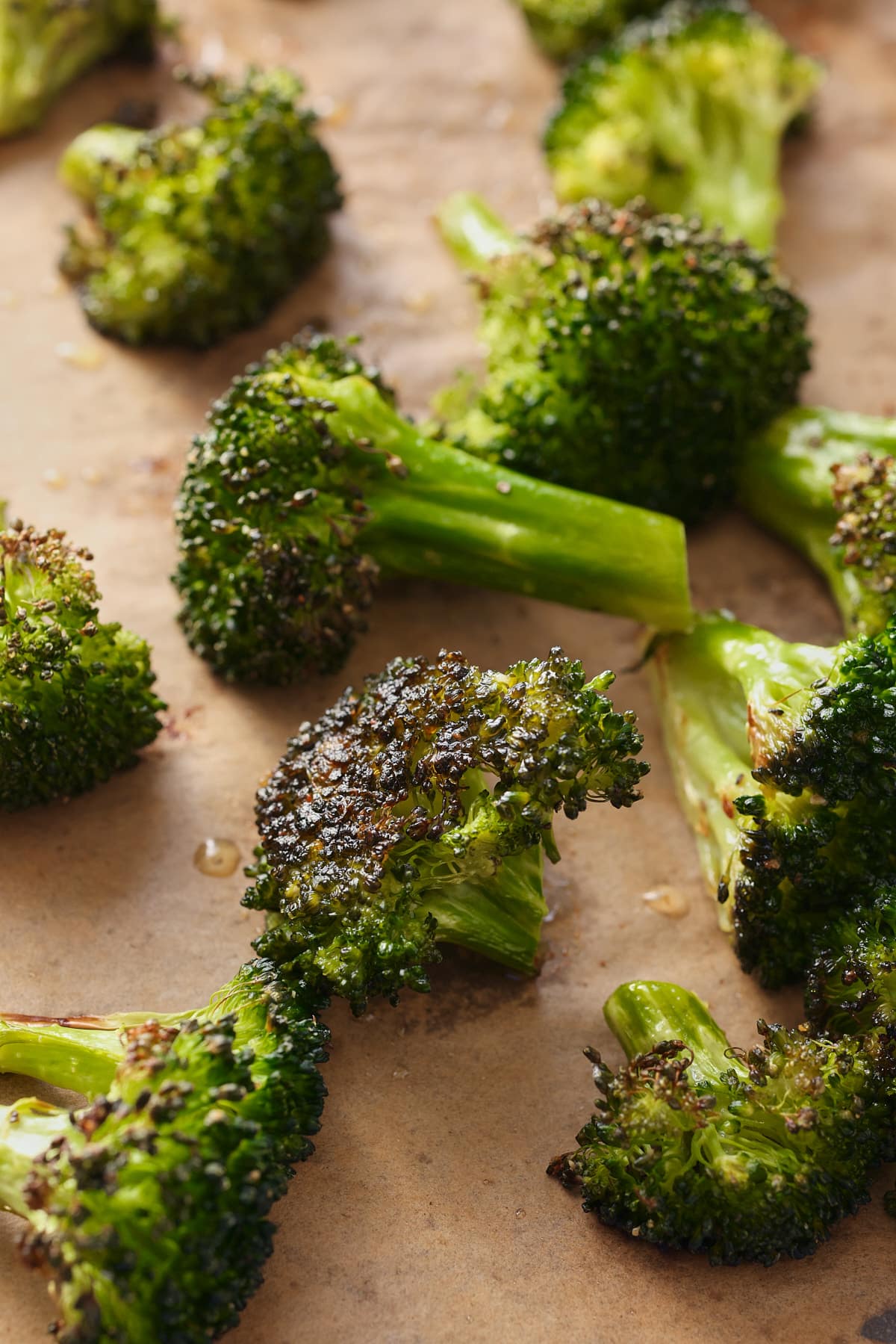 oven roasted broccoli on a baking sheet